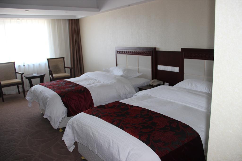 Dalian Southern Airline Pearl Hotel Номер фото