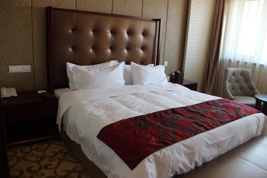 Dalian Southern Airline Pearl Hotel Номер фото
